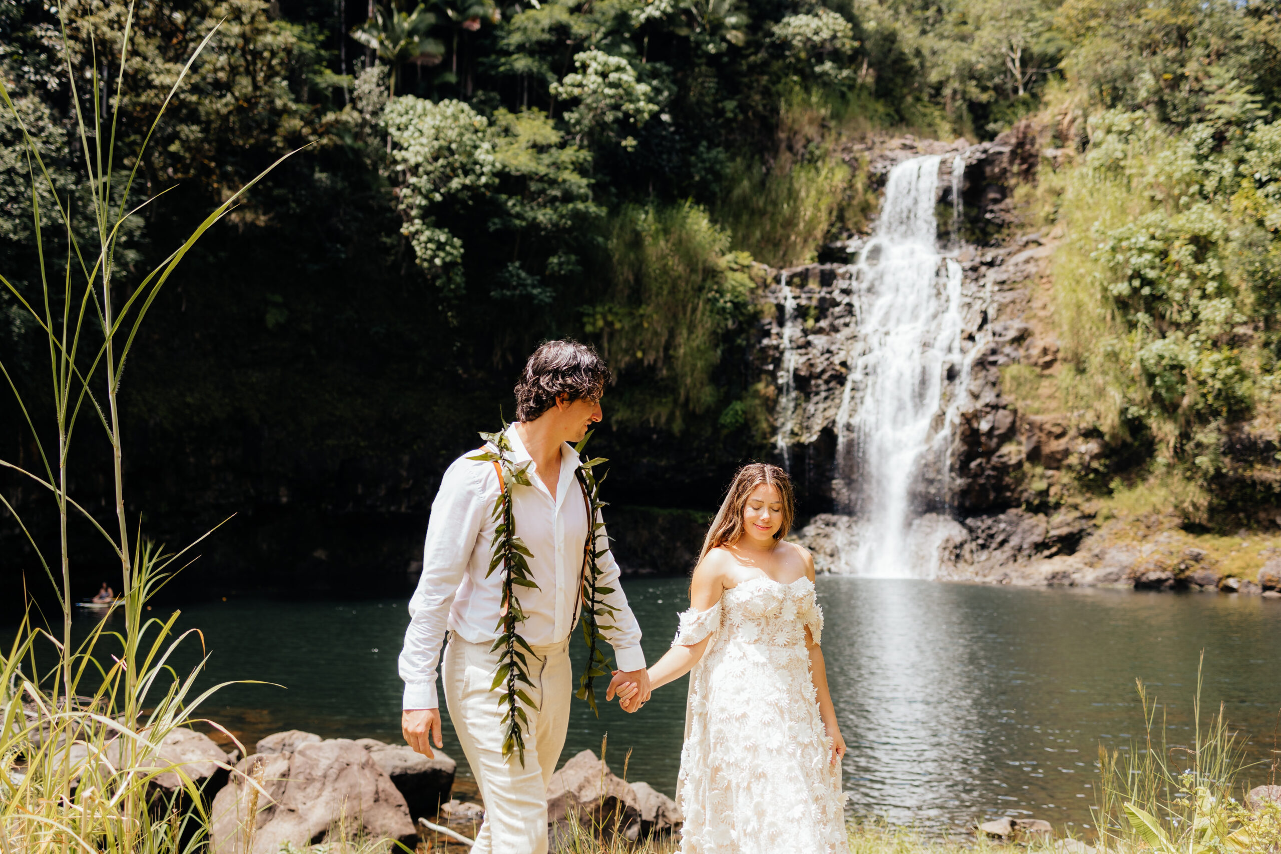 couple holding hands during their elopement at Kulaniapia Resort